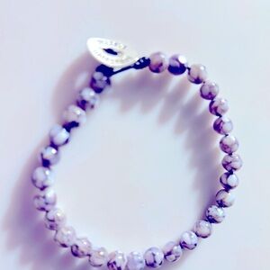 Bracelet Chevron Amethyst, “Believe Happiness” etched silver button clasp 7-7.5”